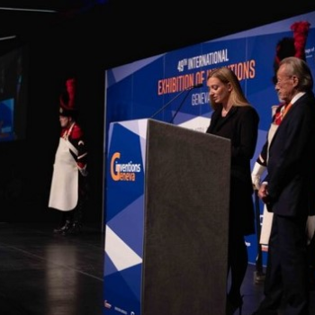 a woman standing at a podium